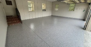 Finished flake epoxy garage floor coating in a two-car residential garage