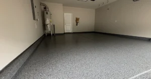 Dust mopping a flake epoxy garage floor as routine maintenance